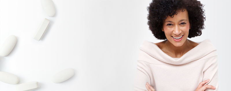 smiling middle aged woman on white background